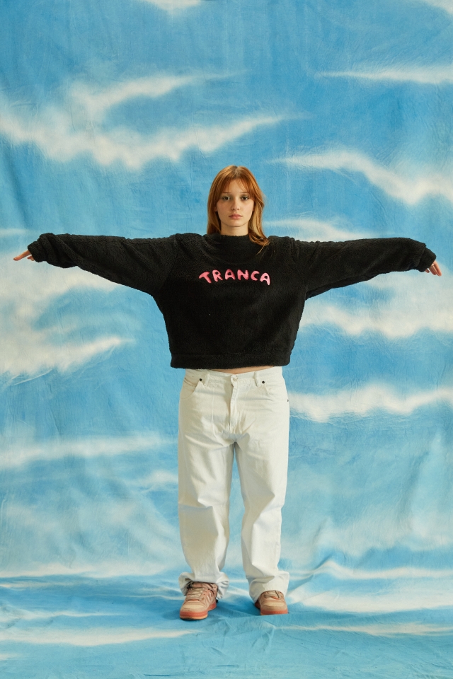 Buzo peluche negro tranca